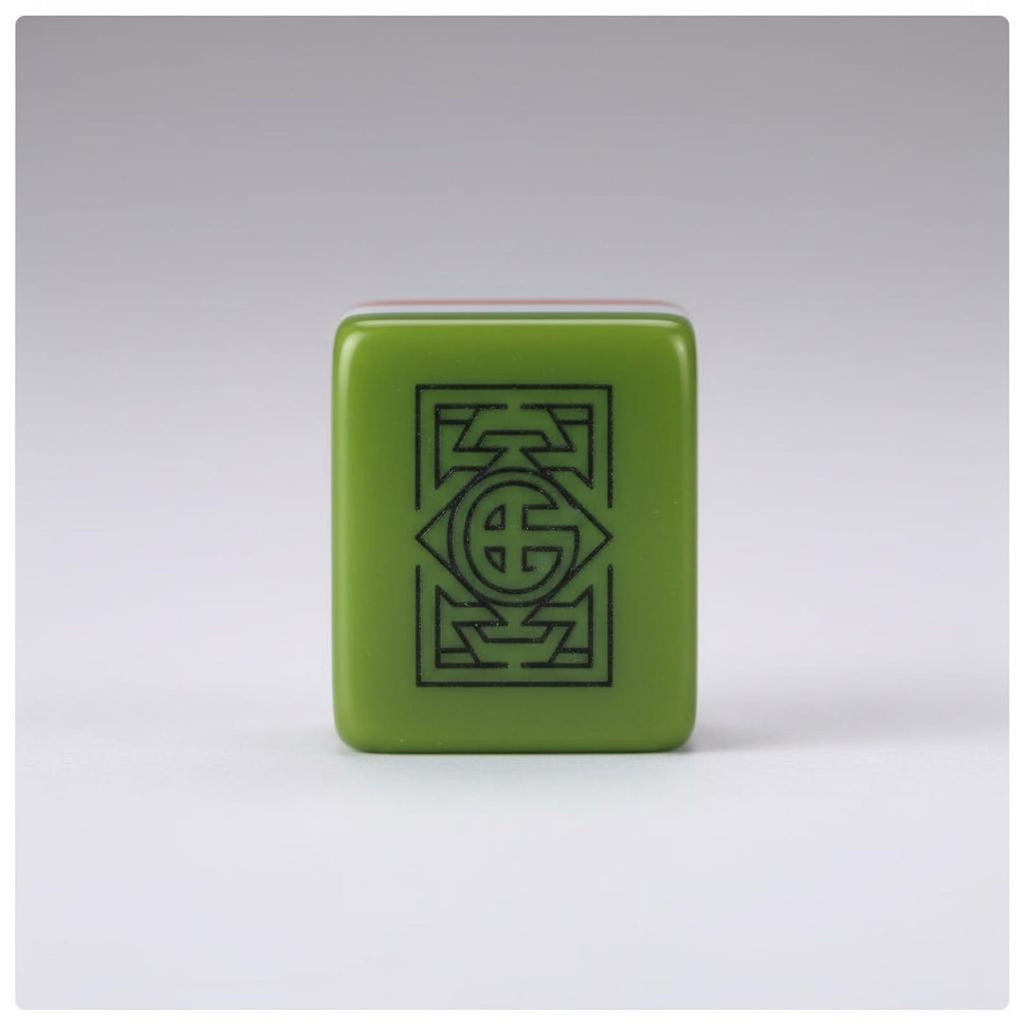 Green acrylic American Mahjong tile showing botanical engraved artwork