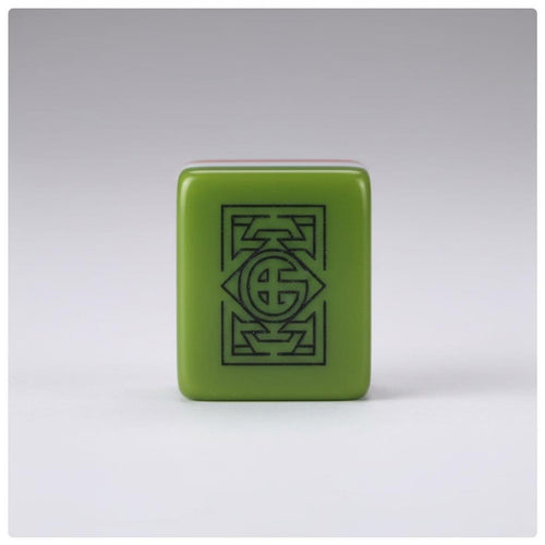 Green acrylic American Mahjong tile showing botanical engraved artwork